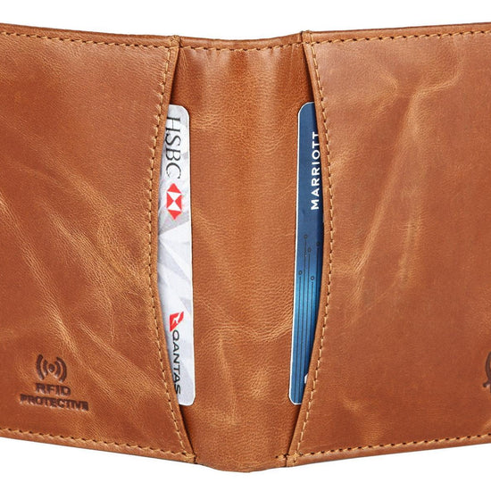 WILDHORN Top Grain Portrait Leather Wallet for Men | Ultra Strong Stitching | Handcrafted | RFID Blocking | 2 ID Slots | 11 Card Slots | Zip Compartment - WILDHORN